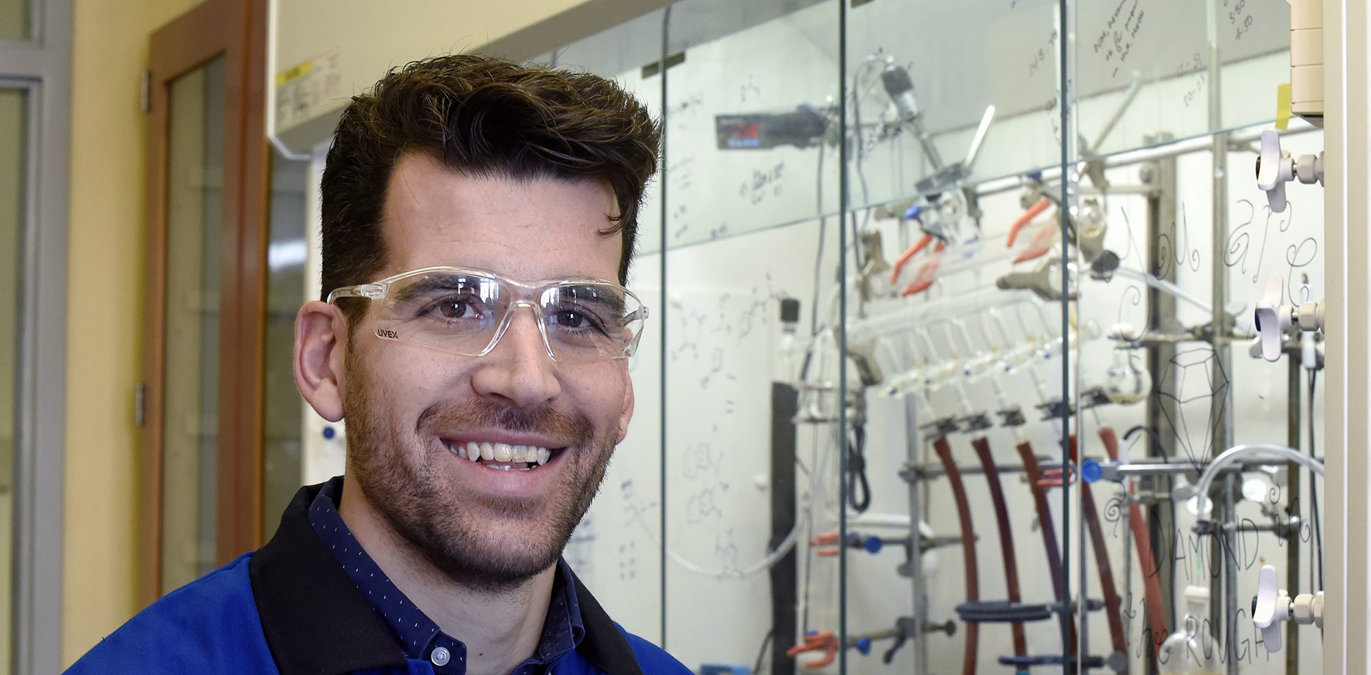 Frank Leibfarth won both an Alfred P. Sloan Research Fellowship and a Cottrell Scholar Award, two top honors given to early-career scientists. (photo by Donn Young) He is pictured here in his lab.