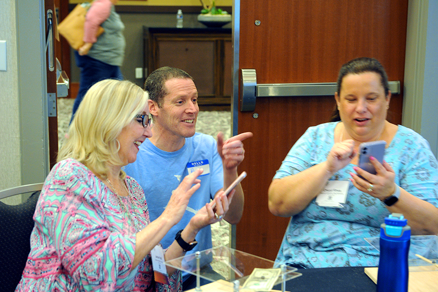 Goldstein shares a laugh with teachers. (photo by Donn Young)