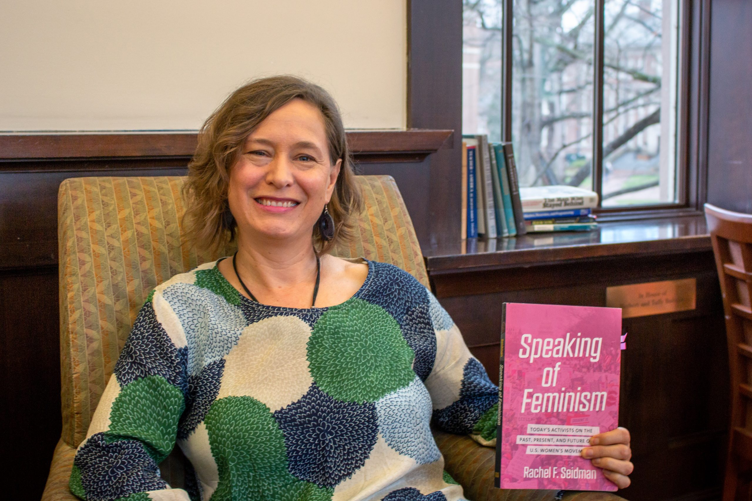 Rachel Seidman's new book is "Speaking of Feminism: Today's Activists on the Past, Present and Future of the U.S. Women's Movement." (photo by Kristen Chavez) She is pictured here holding her book.