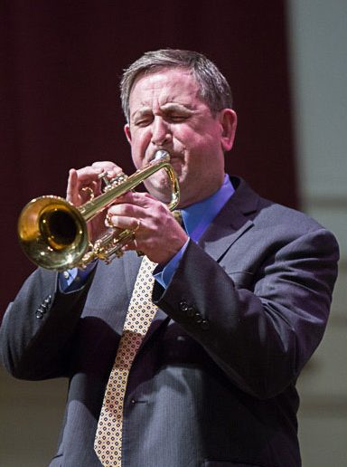 Jim Ketch plays one of his six trumpets. (Photo by Steven Bromberg)