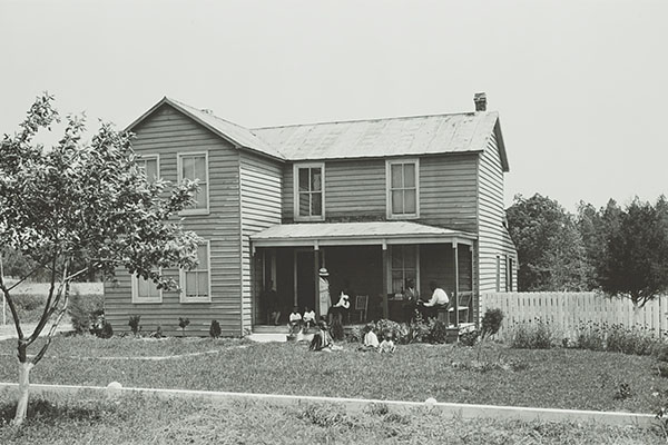 African American family on a front porch between 1925 and 1930. Library of Congress. https://www.loc.gov/item/2010651145/.