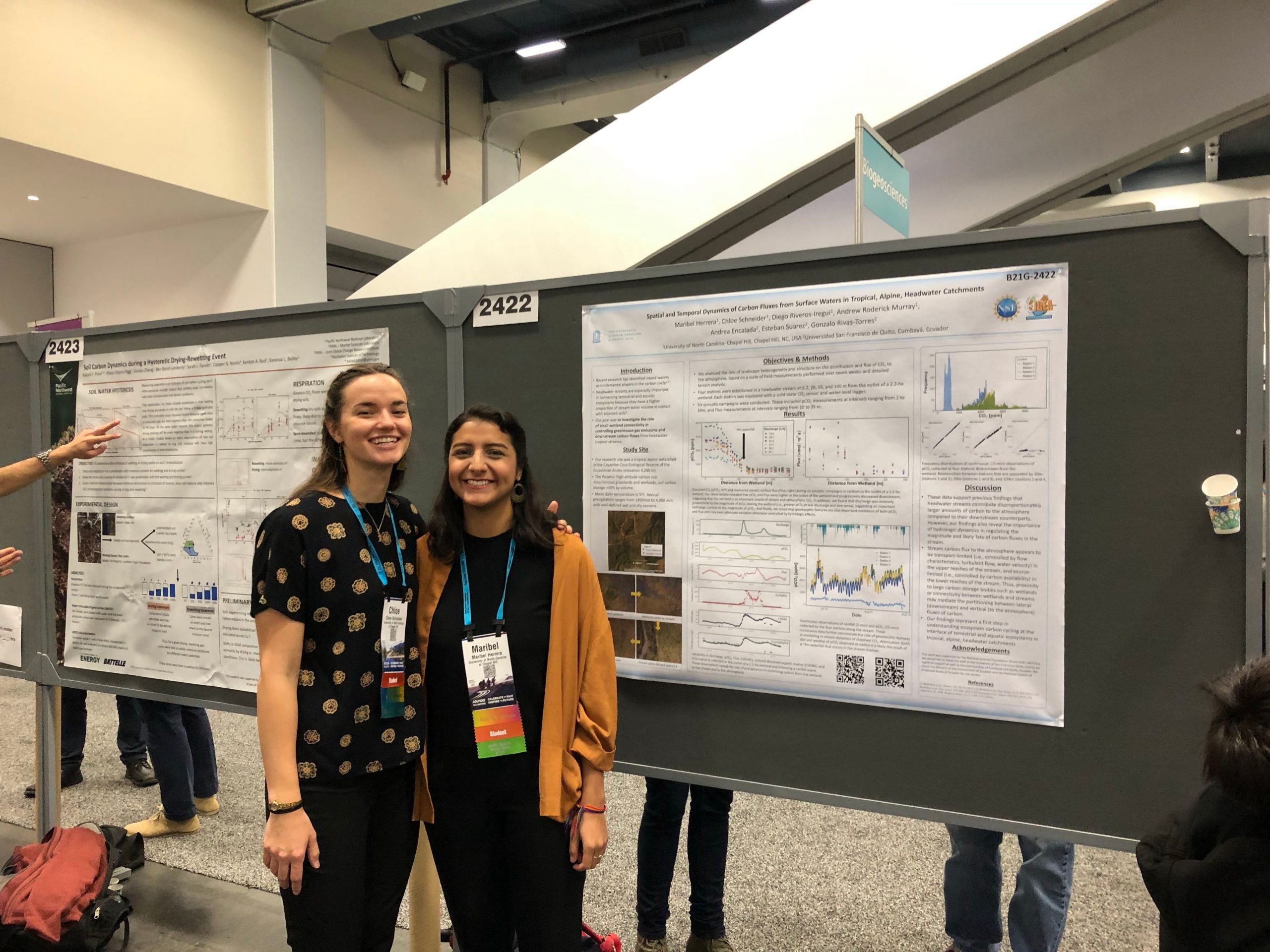 Chloe Schneider and Maribel Herrera present their poster at the American Geophysical Union conference. (photo by Diego Riveros-Iregui)