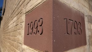 Bricks on the Old East building reading the years 1993 and 1793