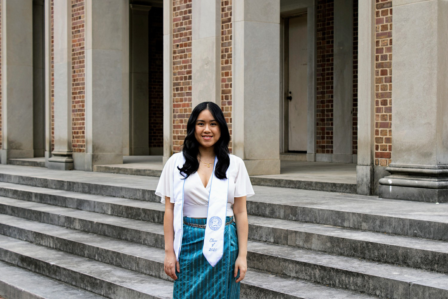 April Bourommavong stands at the UNC Bell Tower.