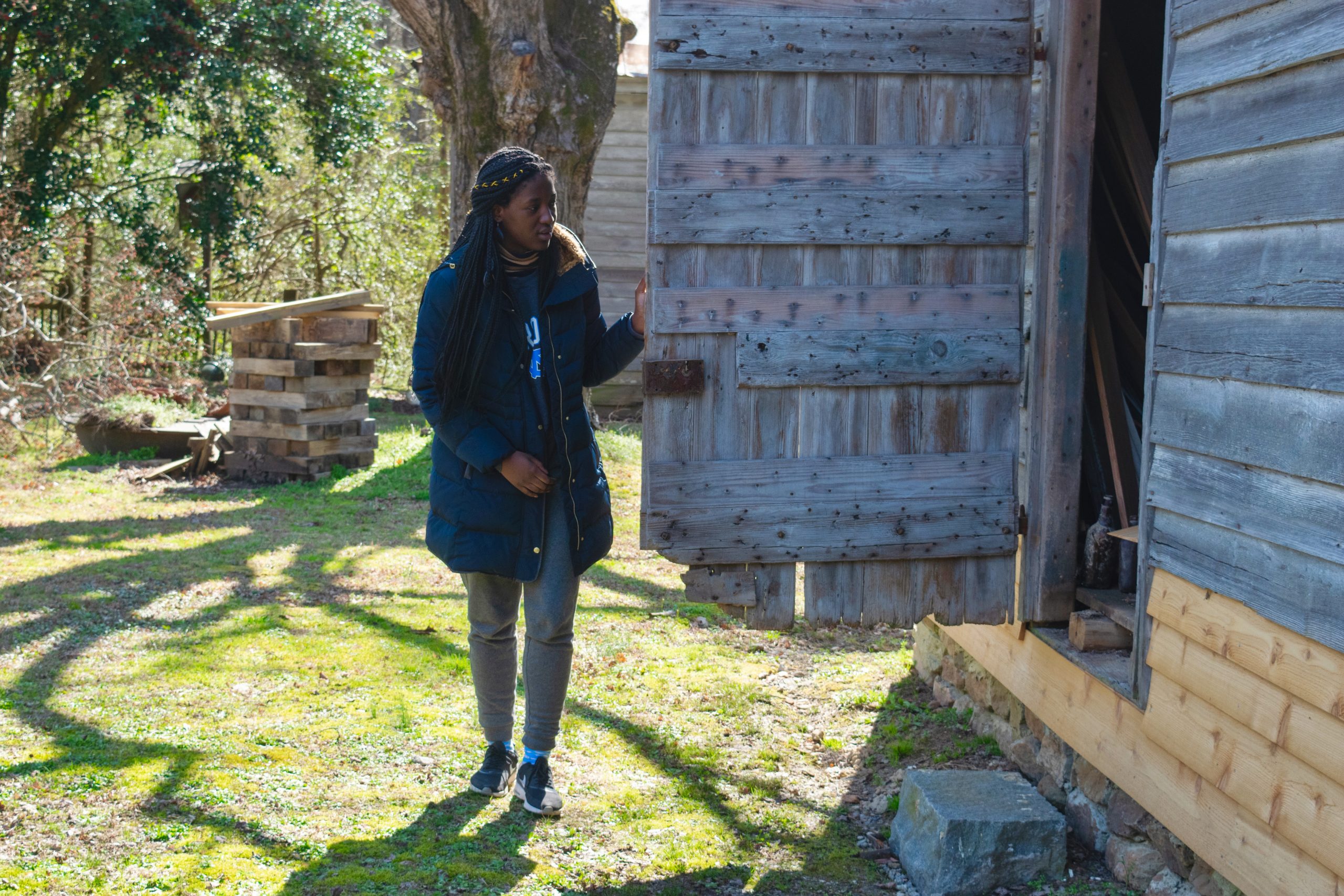 Spring 2020 first-year student Evelyn Moses from the "By Persons Unknown" class at Cherry Hill Plantation. (photo courtesy of Glenn Hinson)