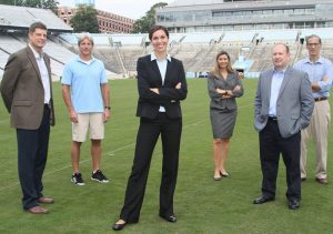 In a pre-pandemic photo, sports administration faculty gather in Carolina’s Kenan Stadium (l-r): Nels Popp, Brad Bates, Erianne Weight, Barbara Osborne, Jonathan Jensen, Bob Malekoff.