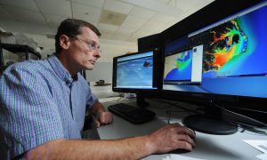Dr. Rick Leuttich, director of the UNC Center for Natural Hazards and Disasters, uses computer modeling to predict storm surge from hurricanes and the areas effected.