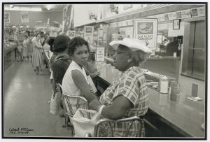 Black women sit at a lunch counter in Lexington, Kentucky.