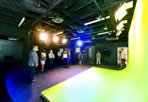 A giant green screen takes up most of the room as visitors are led on a tour of the new Media Art Space studio.
