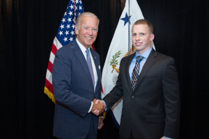 Tim Sloan shakes hands with then-Vice President Joe Biden from when he provided security at U.S. embassies as a Marine. (Photo courtesy Tim Sloan)