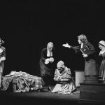 Black and white photo shows actors from the 1976-77 production of "The Crucible."