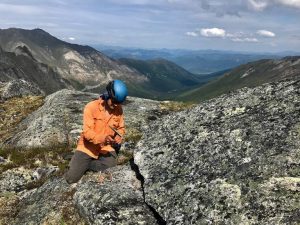 Owen Ryerson collects samples from the Arrigetch Peaks.