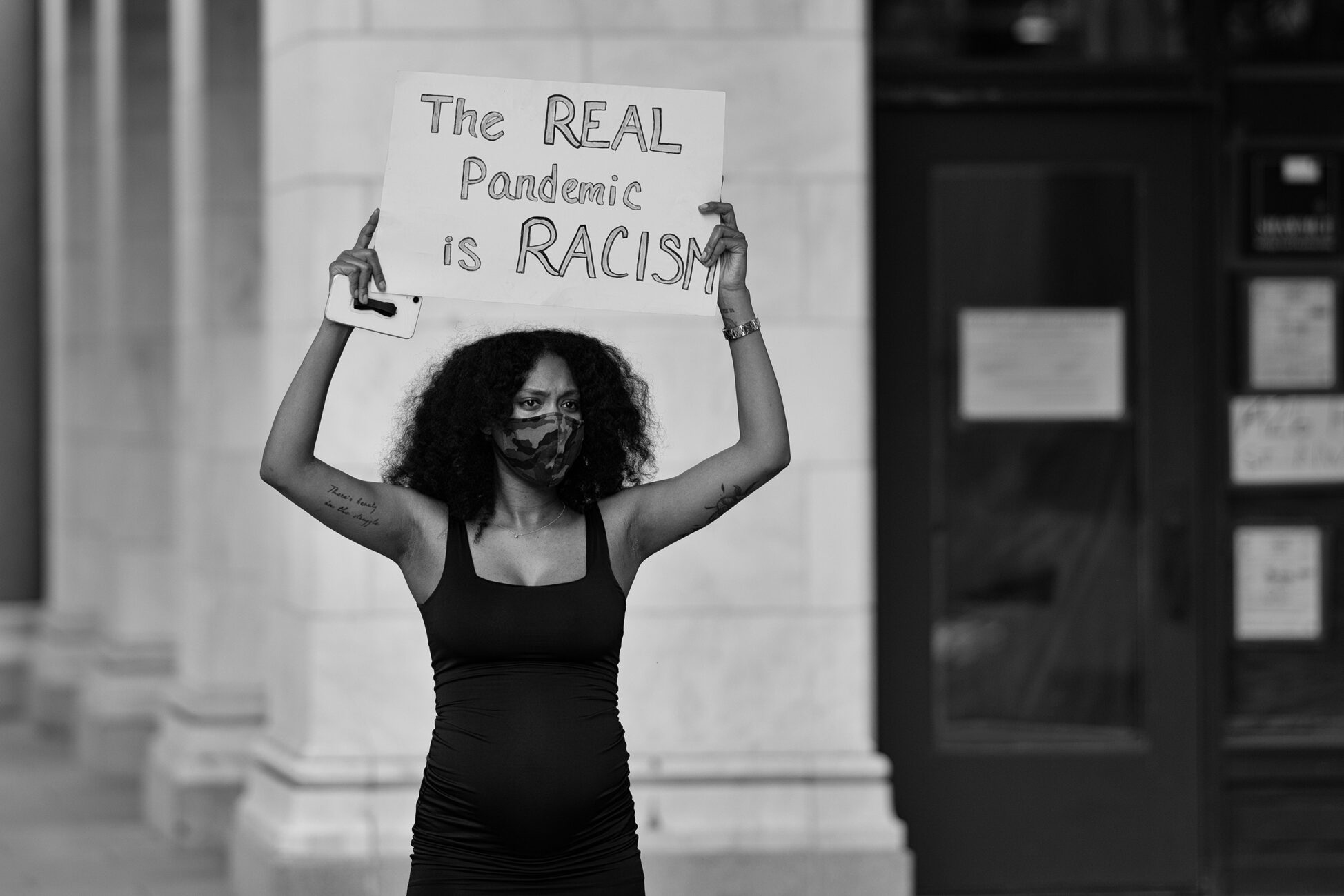 A woman participates in a Black Lives Matter protest in Washington, D.C. (photo by Miki Jourdan, Flickr)