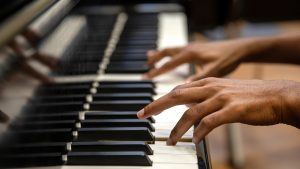 A student playing the piano