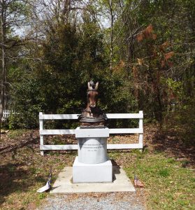 The memorial to Civil War horses depicts the head of a moving horse in artillery gear. It is located on Bentonville Battlefield. (photo by Rusty Long)