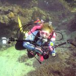 Avid scuba diver Edie Summey on one of her many undersea adventures.