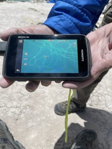 Closeup view of a Garmin GPS device showing the loops involved in the journey to retrieving the mooring from the lake.