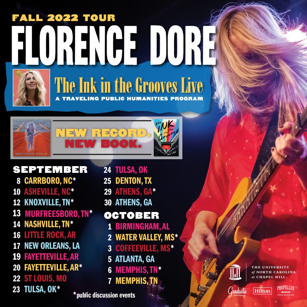 A tour poster advertises the dates of Dore's tour along with a photo of her playing the guitar.