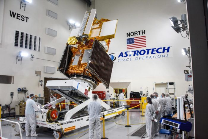 The Surface Water and Ocean Topography (SWOT) spacecraft is moved into a transport container inside the Astrotech facility at Vandenberg Space Force Base in California on Nov. 18, 2022. Photo credit: USSF 30th Space Wing/Chris Okula