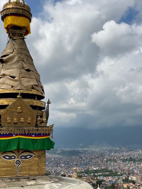 An image of the top of the stupa, looking out onto Kathmandu city. 