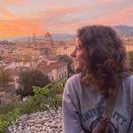 Junior Madi Marks gazes out over a cityscape in Italy during a study abroad trip.