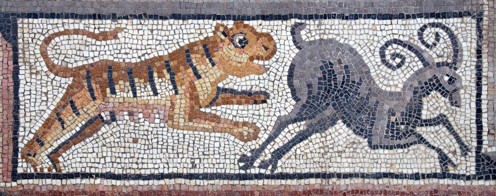 Mosaic showing two animals -- a tiger chasing an ibex.