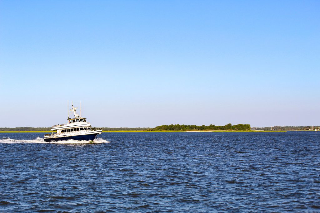 A ferry crosses the Cape Fear River channel on its way to Bald Head Island.