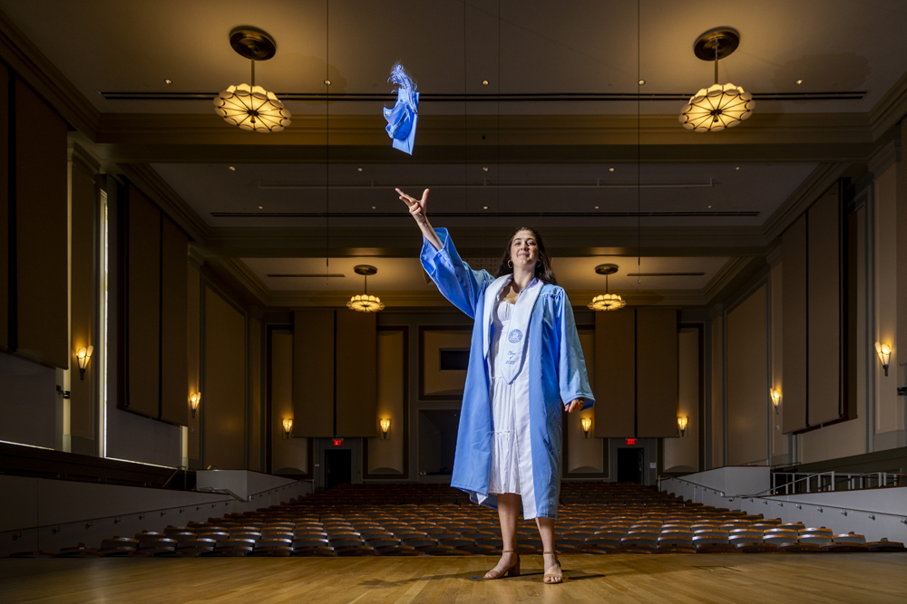 Carrina Macaluso is a graduating senior majoring in music -- she stands on the stage in Hill Hall throwing her graduation cap in the air.