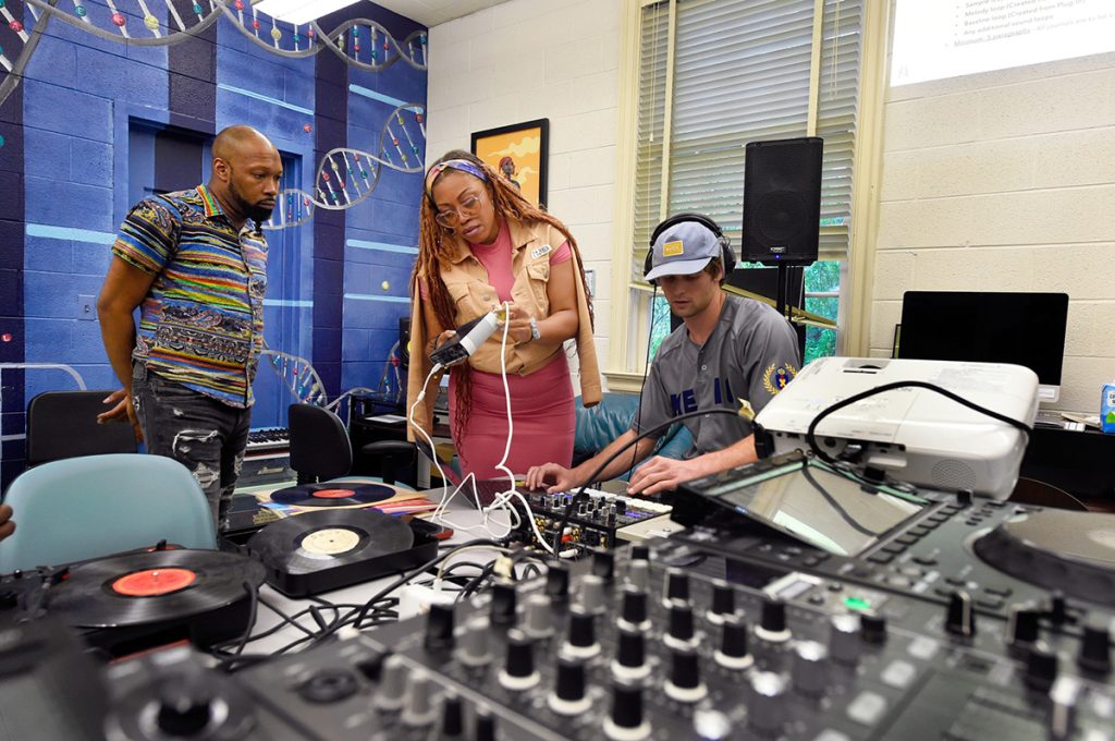 Professor Maya Shipman (Suzi Analogue) and another instructor work with a student in the Beat Lab at the Carolina Hip Hop Institute summer 2024.